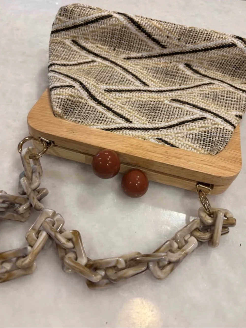 N/A woven clutch